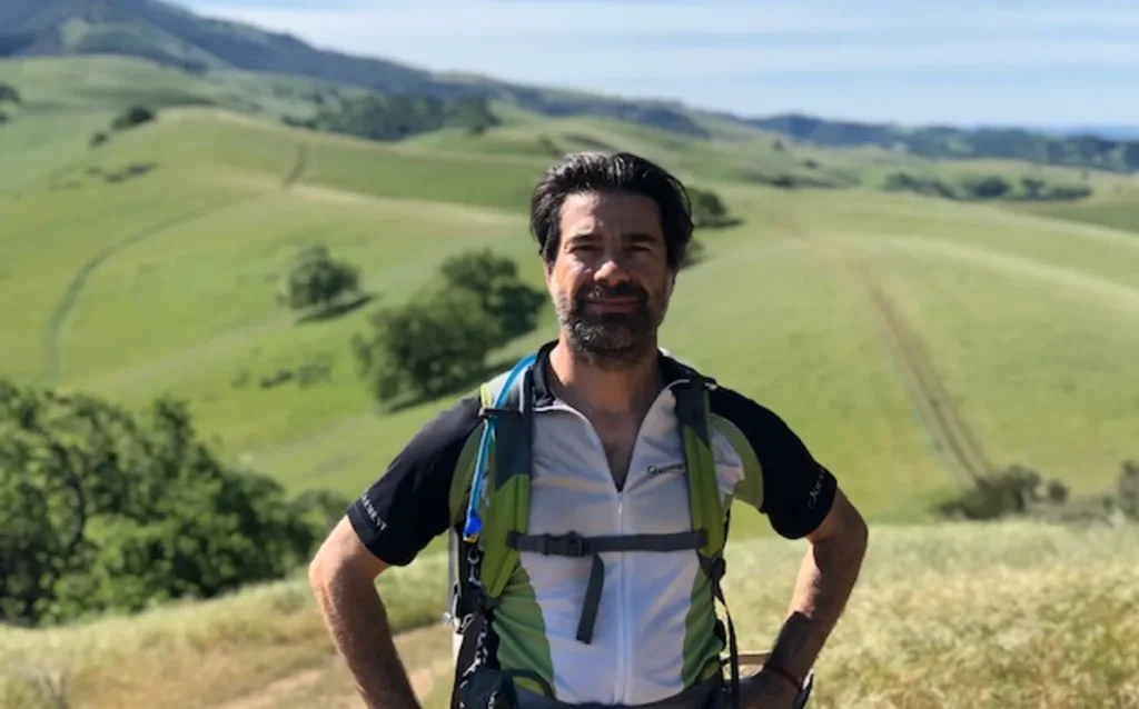 phillip lolonis posing in a natural setting for healing with hiking